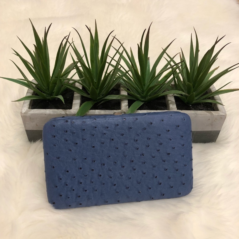 Blue leather clutch